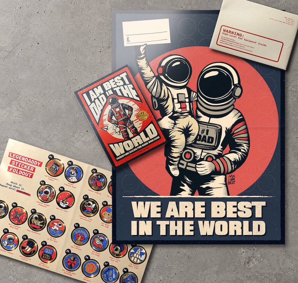 A styled flat-lay of the I AM BEST Dad in the world Book, poster, legendaddy sticker foldout and the christmas letter package.